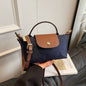 Mini Dumpling Crossbody Bag — Color-Block Nylon Phone Bag | Women 2025