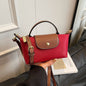 Mini Dumpling Crossbody Bag — Color-Block Nylon Phone Bag | Women 2025