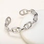Titanium - Steel Gold - Plated C - Shaped Open - Ended Bangle. A Unique, Irregularly Spliced And Niche Accessory For Women.