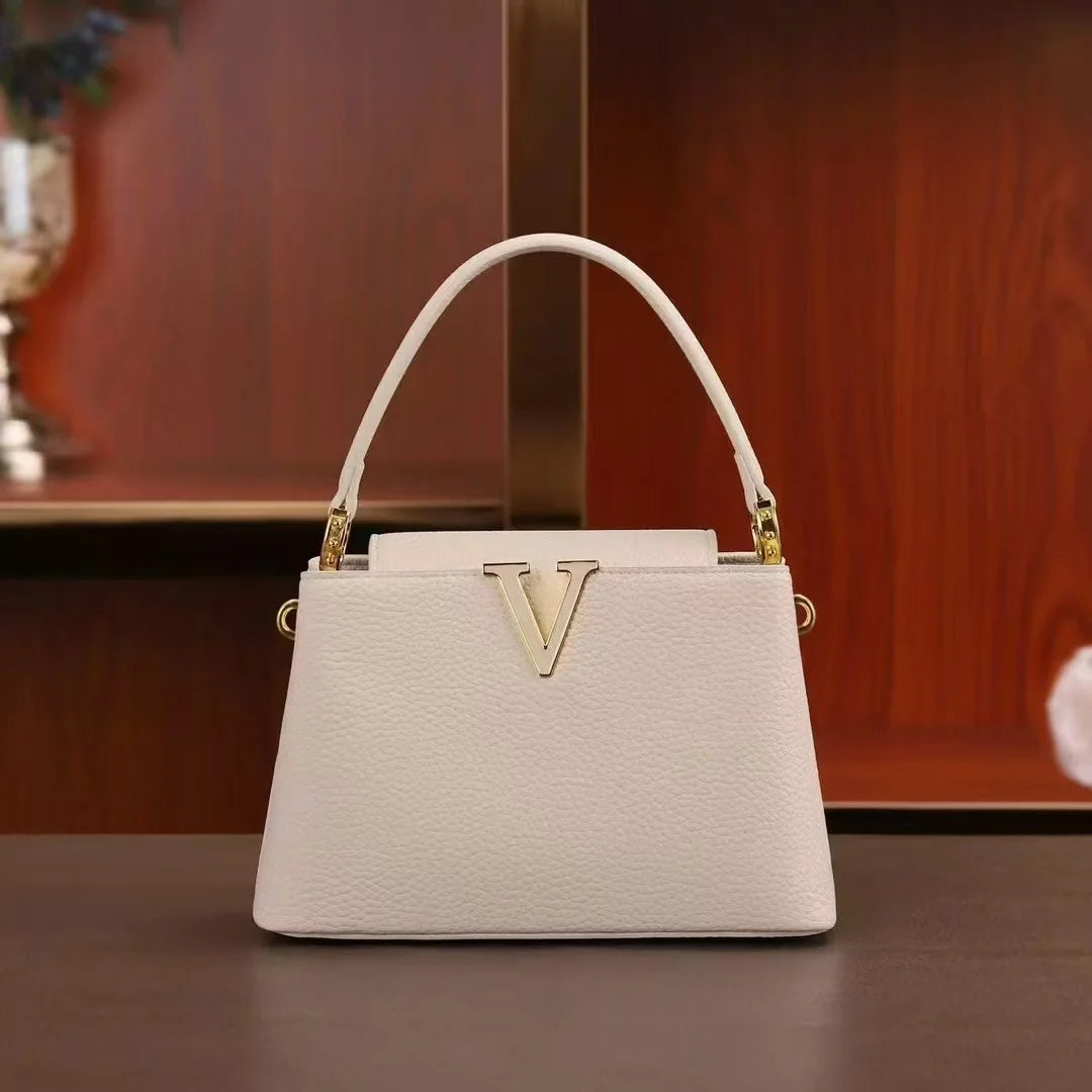 New 2025 simple V-shaped decorative handheld fashionable messenger bag trendy bucket women's small bag