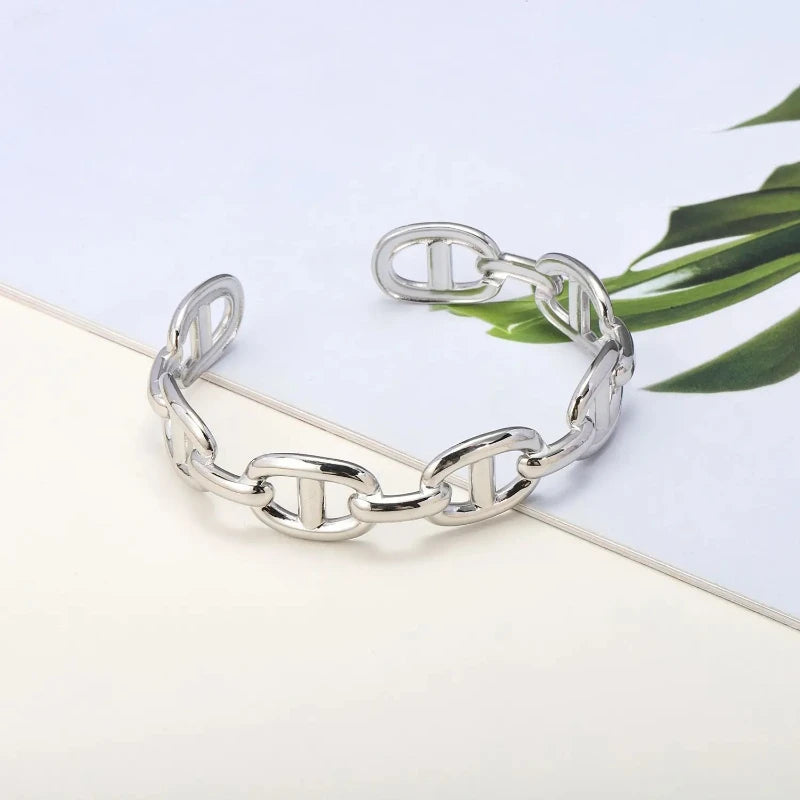 Titanium - Steel Gold - Plated C - Shaped Open - Ended Bangle. A Unique, Irregularly Spliced And Niche Accessory For Women.