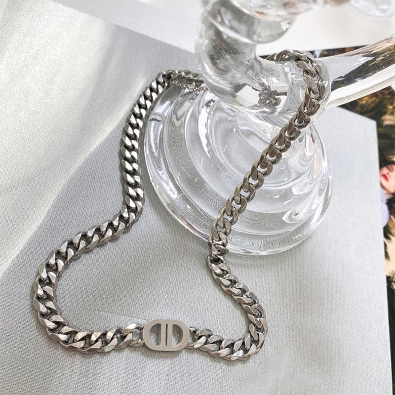 Cocoguchi golden color Thick Letter Titanium Steel Necklace & Bracelet for Women four sealsonal wearage popular fashion jewelry