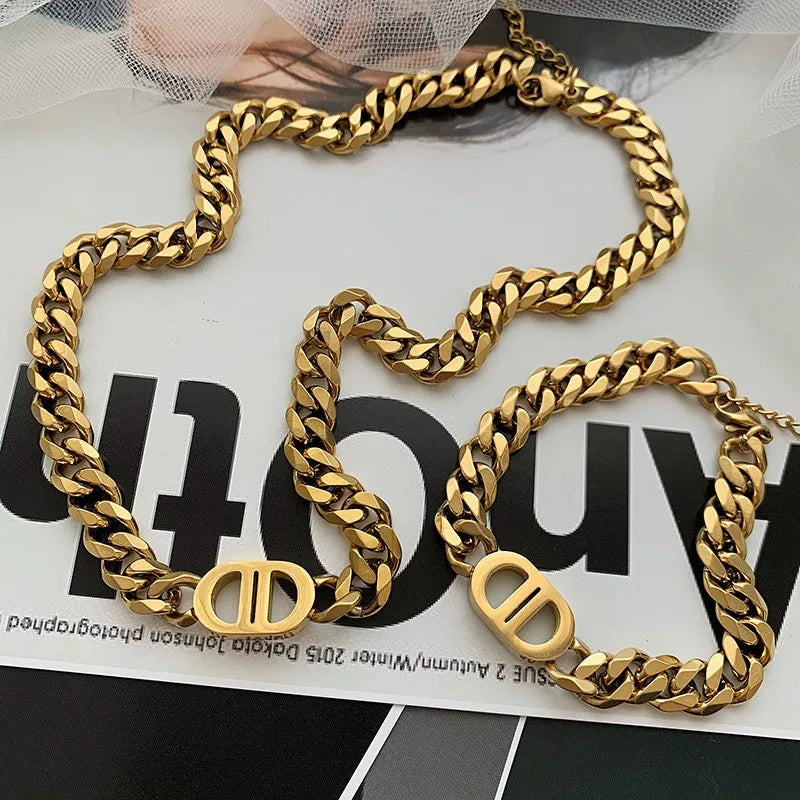Cocoguchi golden color Thick Letter Titanium Steel Necklace & Bracelet for Women four sealsonal wearage popular fashion jewelry